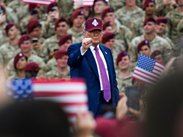 trump commander in chief FORT BRAGG, NORTH CAROLINA - JUNE 10: U.S. President Donald Trump pumps his fist to the cr