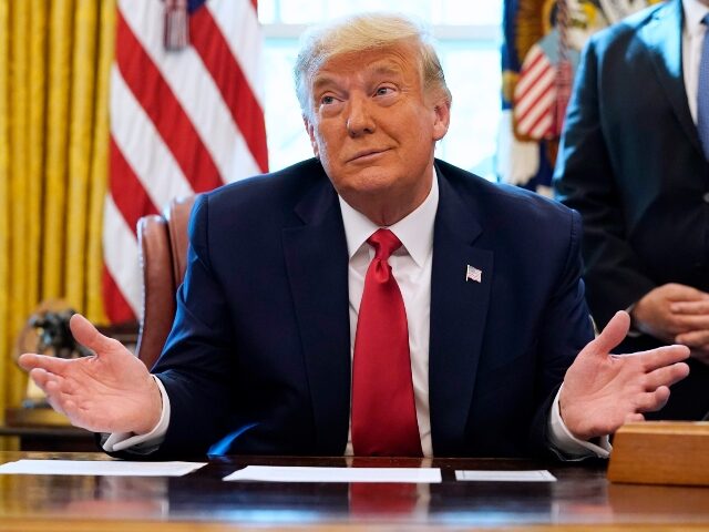 trump-shrug-smirk-AP President Donald Trump listens while on a phone call with the leaders of Sudan and Israel,