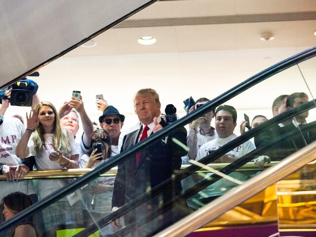 NEW YORK, NY - JUNE 16: Business mogul Donald Trump rides an escalator to a press event to