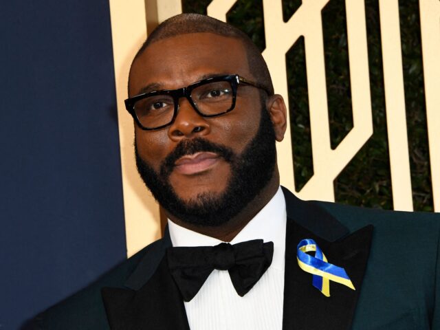 Tyler Perry Denies US actor and producer Tyler Perry wears a ribbon with the colors of the Ukrainian flag as