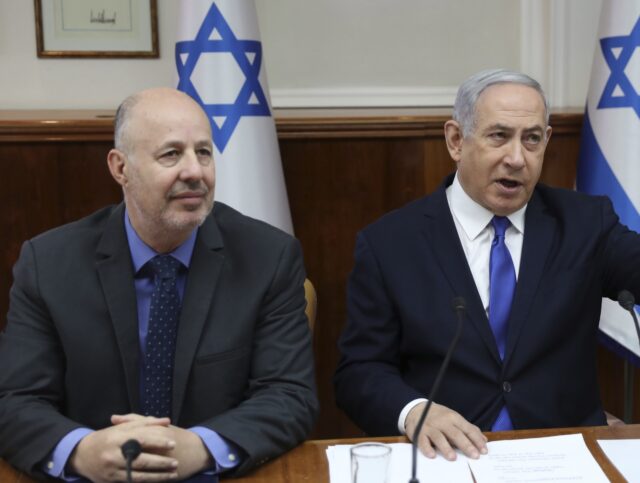 Tzachi Hanegbi (Abir Sultan /Pool photo via Associated Press) Israeli Prime Minister Benjamin Netanyahu, center, Minister for Regional Cooperation Tzach