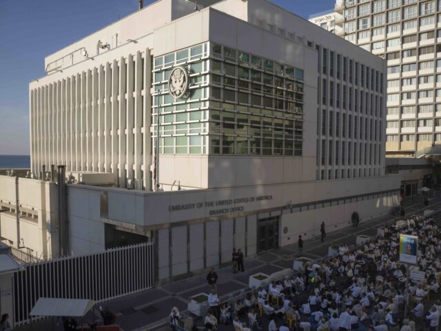 U.S. Embassy branch Tel Aviv (Ohad Zwigenberg / Associated Press, File) FILE - Activists sit in front of the U.S. Embassy branch office in Tel Aviv, Israel, durin