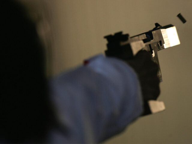 Woman Holding Glock Munkhbayar Dorjsuren of Germany shoots during the women's 25 metre pistol qualifying