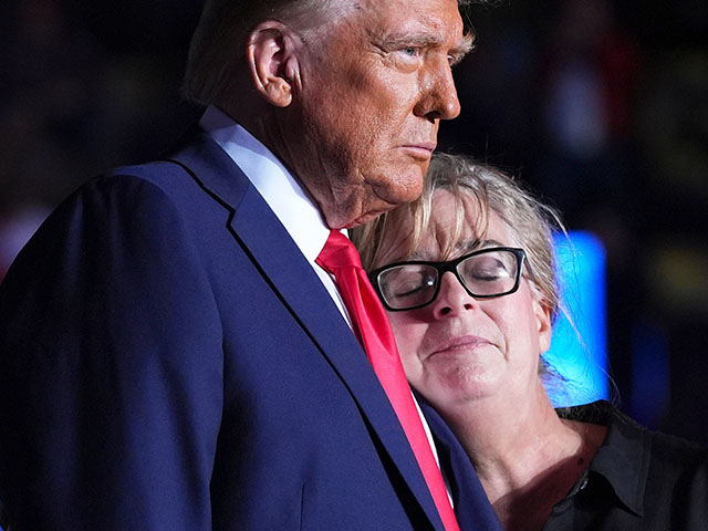 ap24309751605586 Republican presidential nominee former President Donald Trump embraces Patty Morin, mother of Rachel Morin, during a campaign rally at Santander Arena, Monday, Nov. 4, 2024, in Reading, Pa. (AP Photo/Evan Vucci)