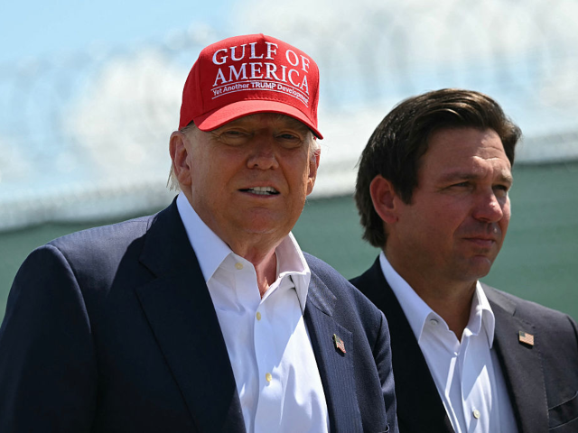 GettyImages-2222319895 US President President Donald Trump and Florida Governor Ron DeSantis tour a migrant deten