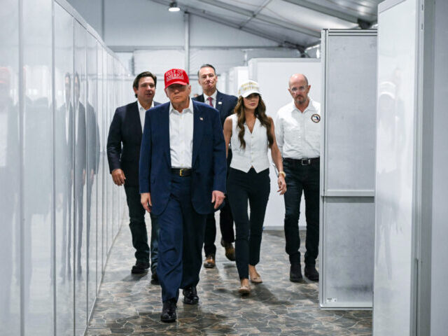 US President President Donald Trump (2L), Florida Governor Ron DeSantis (L), and Secretary