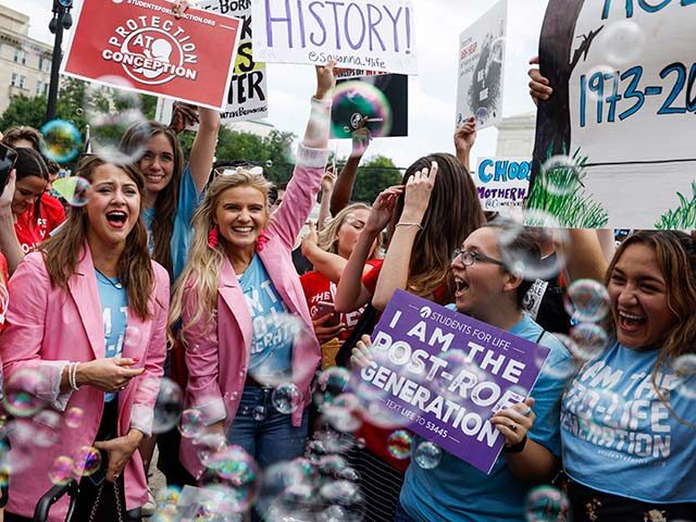 gettyimages1404904680-640x480-1 Anti-abortion right activists celebrate after the announcement to the Dobbs v Jackson Wome