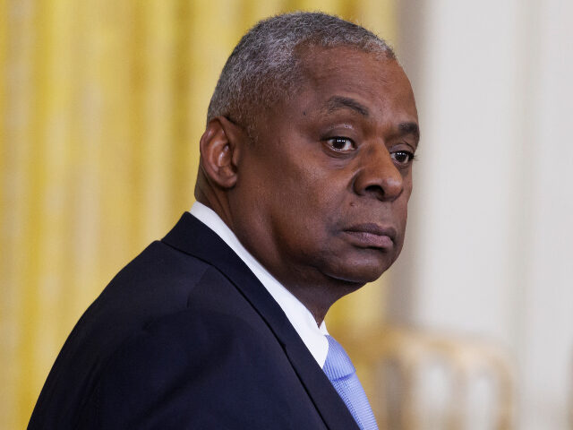 Lloyd Austin Secretary of Defense Lloyd Austin looks on from the East Room of the White House during a