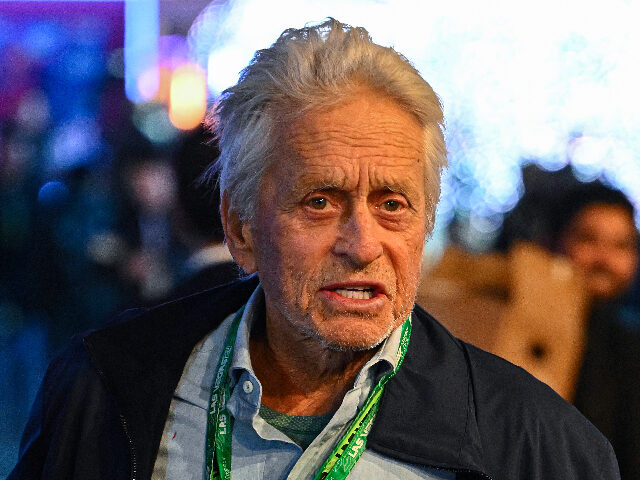 Michaeldouglas LAS VEGAS, NEVADA - NOVEMBER 22: Michael Douglas walks in the Paddock during qualifying ah