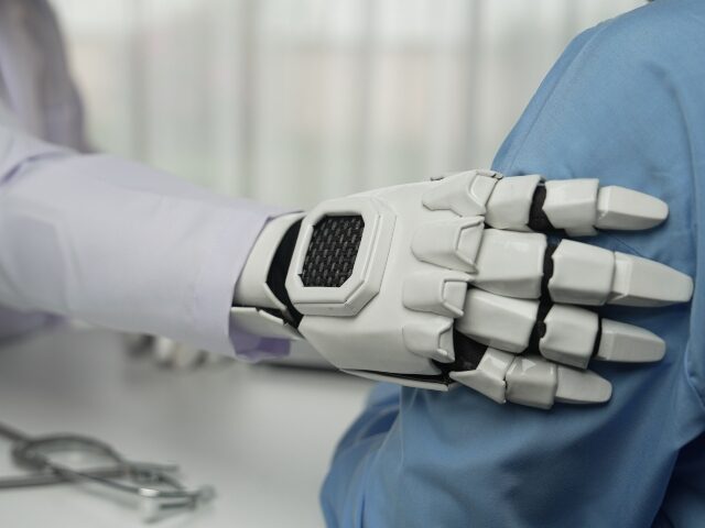 Robot doctor touches patient